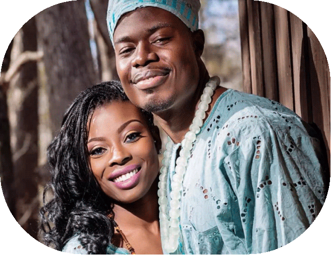 Joyful couple in traditional attire showing bright smiles, representing O2 Dental Group cosmetic results.